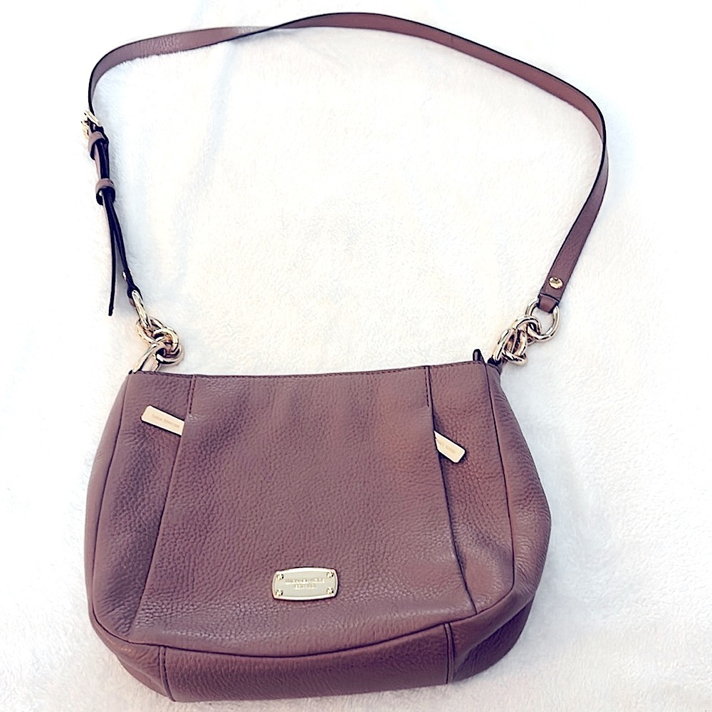 Rose color Michael Kors crossbody purse with gold accents